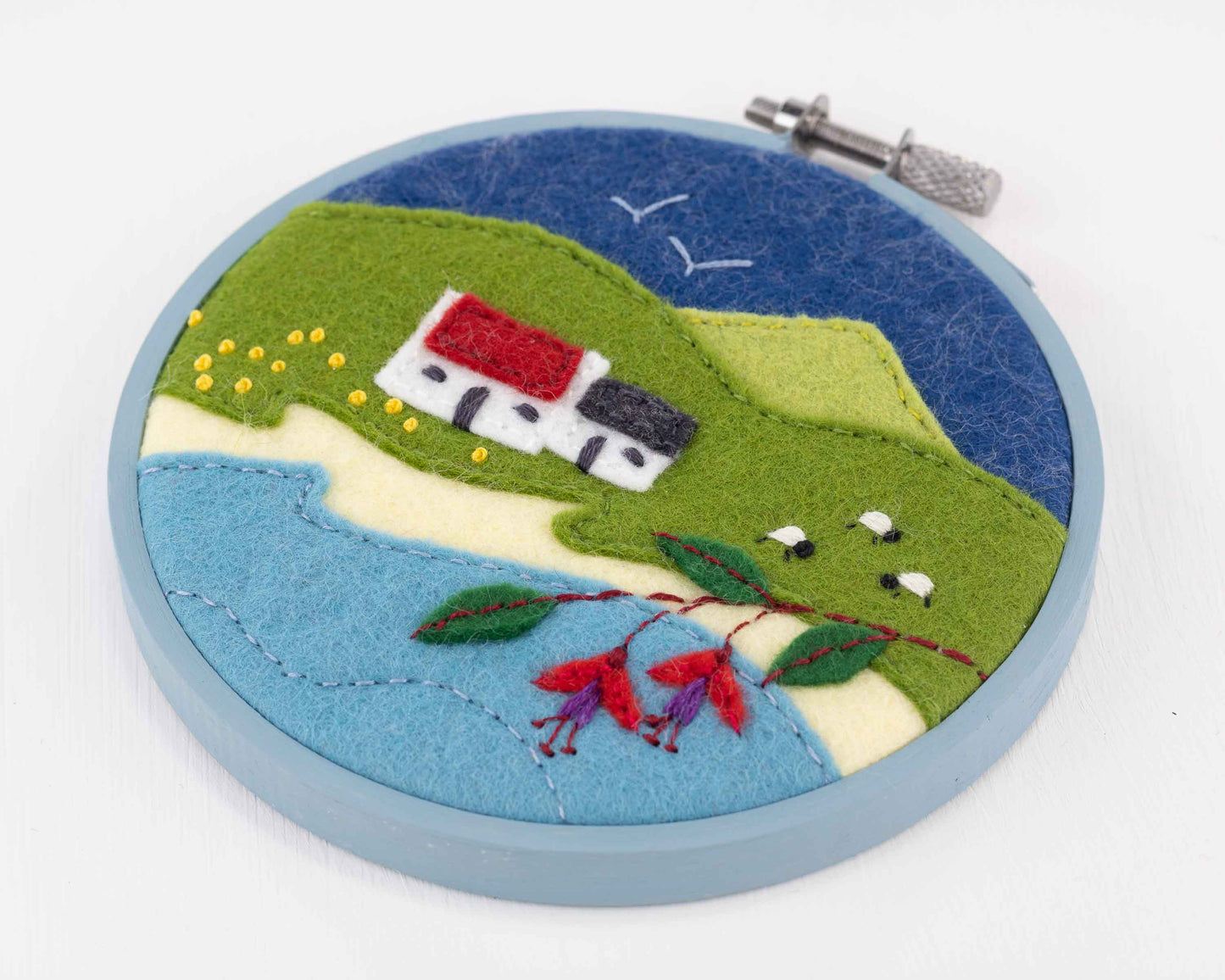 Hoop framed Irish landscape embroidery