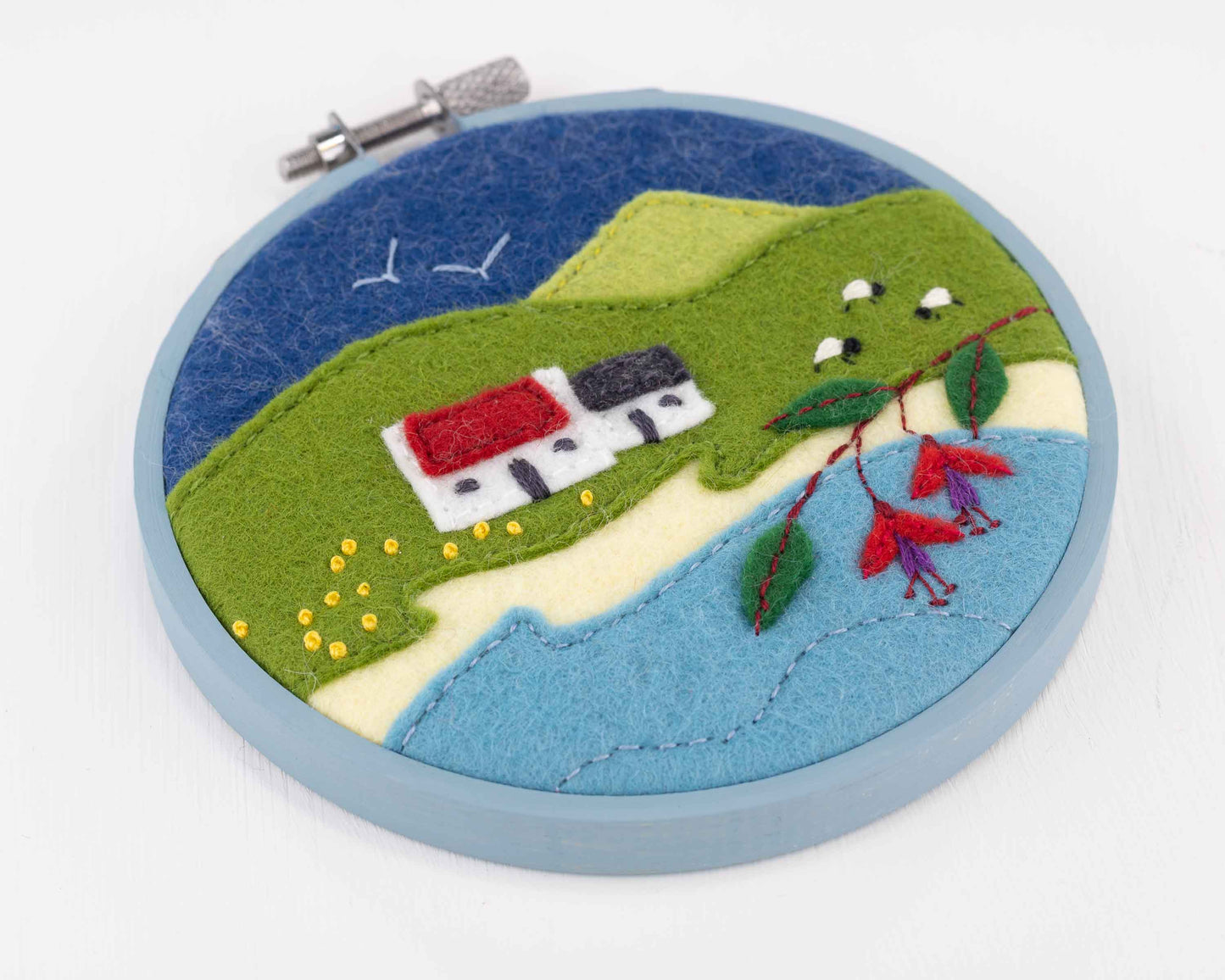 Hoop framed Irish landscape embroidery
