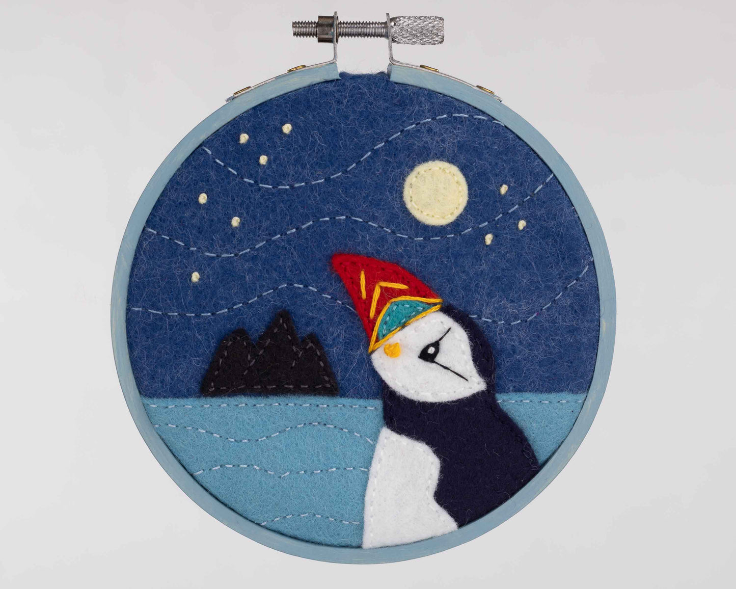 Hoop framed puffin embroidery, Puffin Cottage