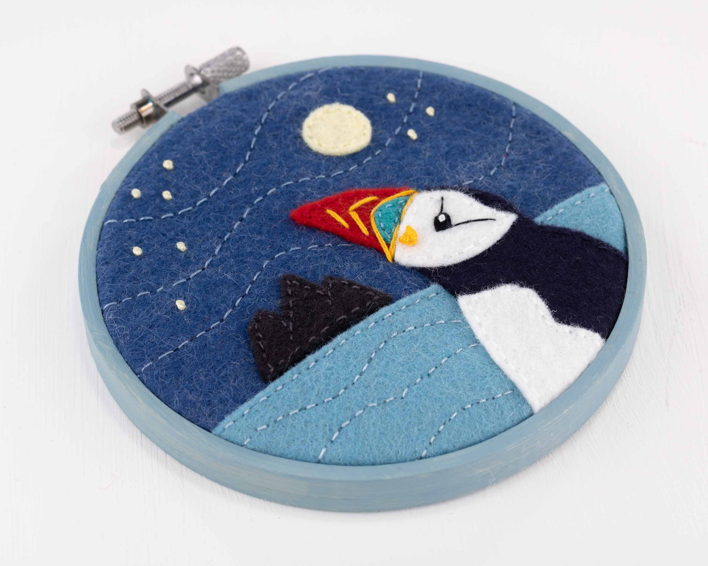 Moon gazing puffin framed embroidery