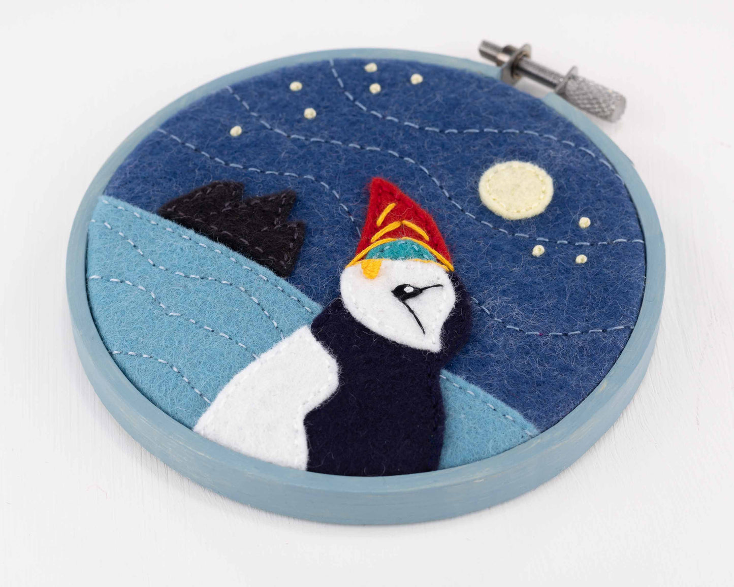 Moon gazing puffin framed embroidery