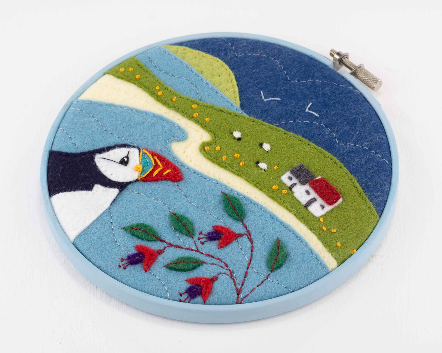 Hoop framed puffin embroidery, Puffin Cottage