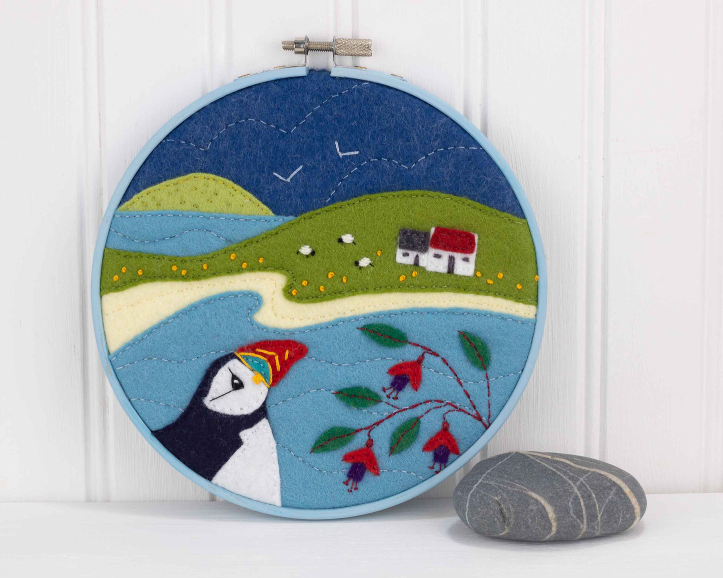 Hoop framed puffin embroidery, Puffin Cottage