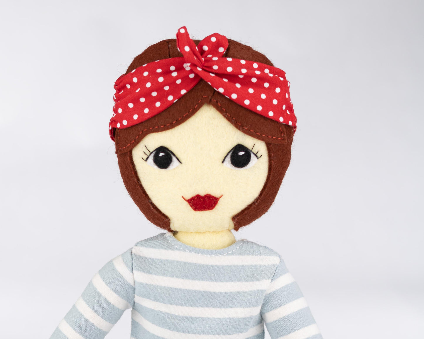 Close up of Tilly's face showing her chestnut brown bob hairstyle