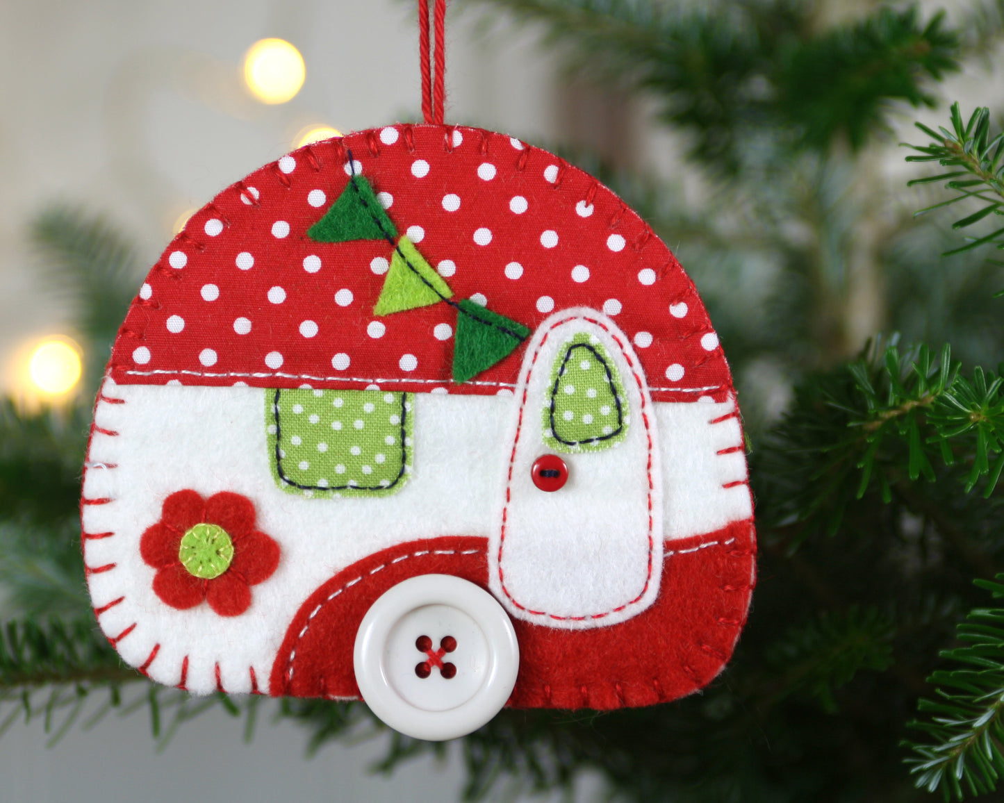 Large camper Christmas ornament in red and white